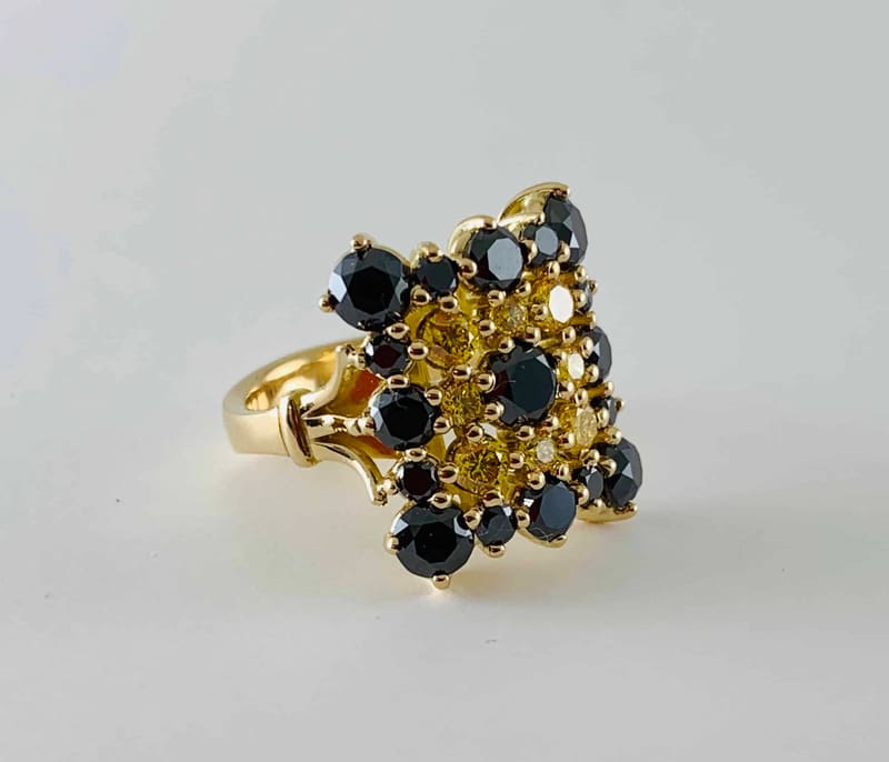 Cocktail ring with black and yellow diamonds
