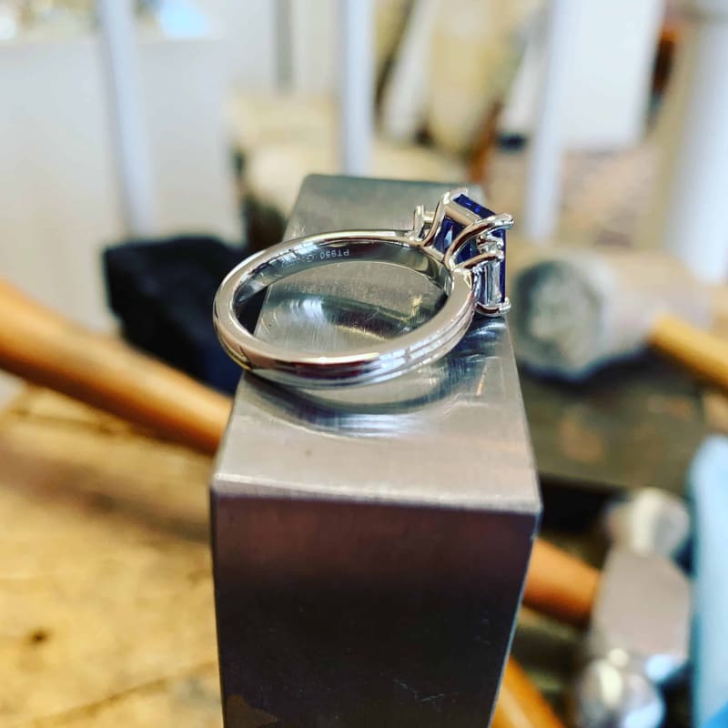 The sapphire and diamond ring from the side